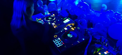 Florin student DJing a middle school dance