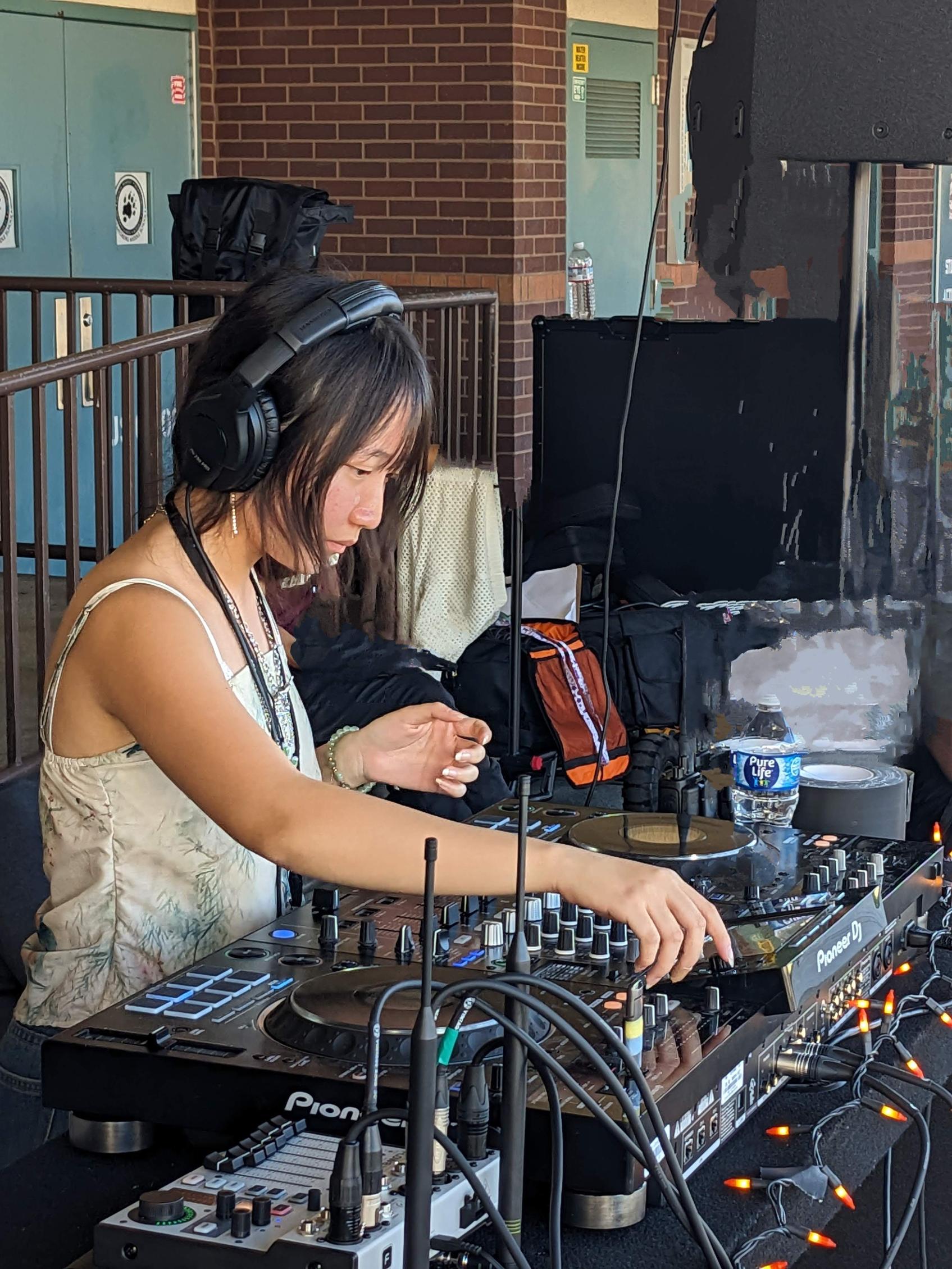 AMP Academy student DJing an outdoor school festival